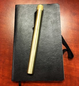 Karas Kustoms Render K in Brass EDC