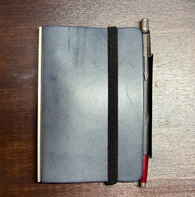 Plotter Mini 5 cover with a Parker Jotter in the pen sleeve