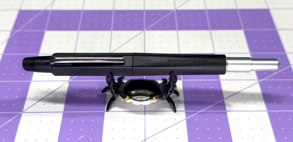 Endless Creator Retractable Fountain Pen on a Crab Pen holder