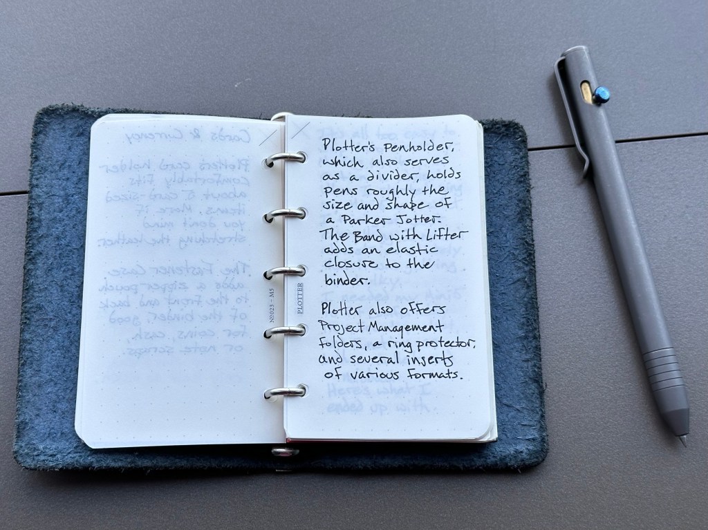 Plotter’s pen holder, which also serves as a divider, holds pens roughly the size and shape of a Parker Jotter. The Band with Lifter adds an elastic closure to the binder. Plotter also offers project management folders, a ring protector, and several inserts of various formats.