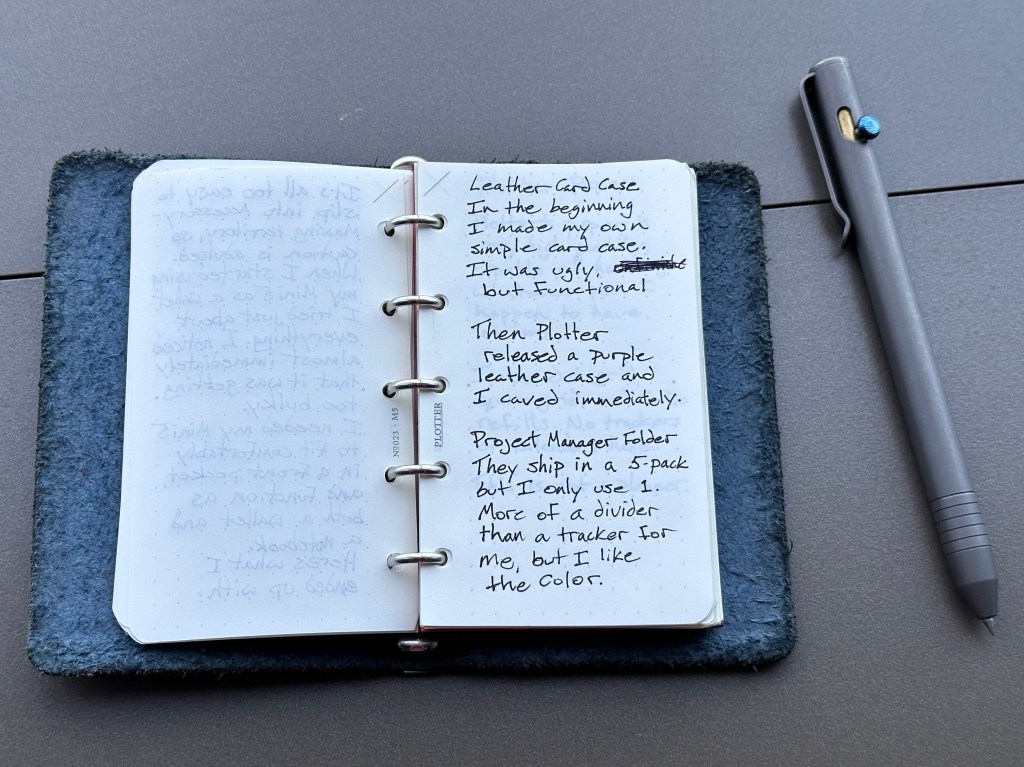 Leather Card Case In the beginning I made my own simple card case. It was ugly, but functional. Then Plotter released a purple leather case and I caved immediately. Project Manager folder They ship in a 5-pack, but I only use 1. More of a divider than tracker for me, but I like the color.